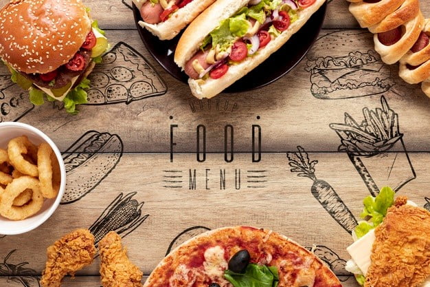 Arrangement of fast food on wooden background Free Psd